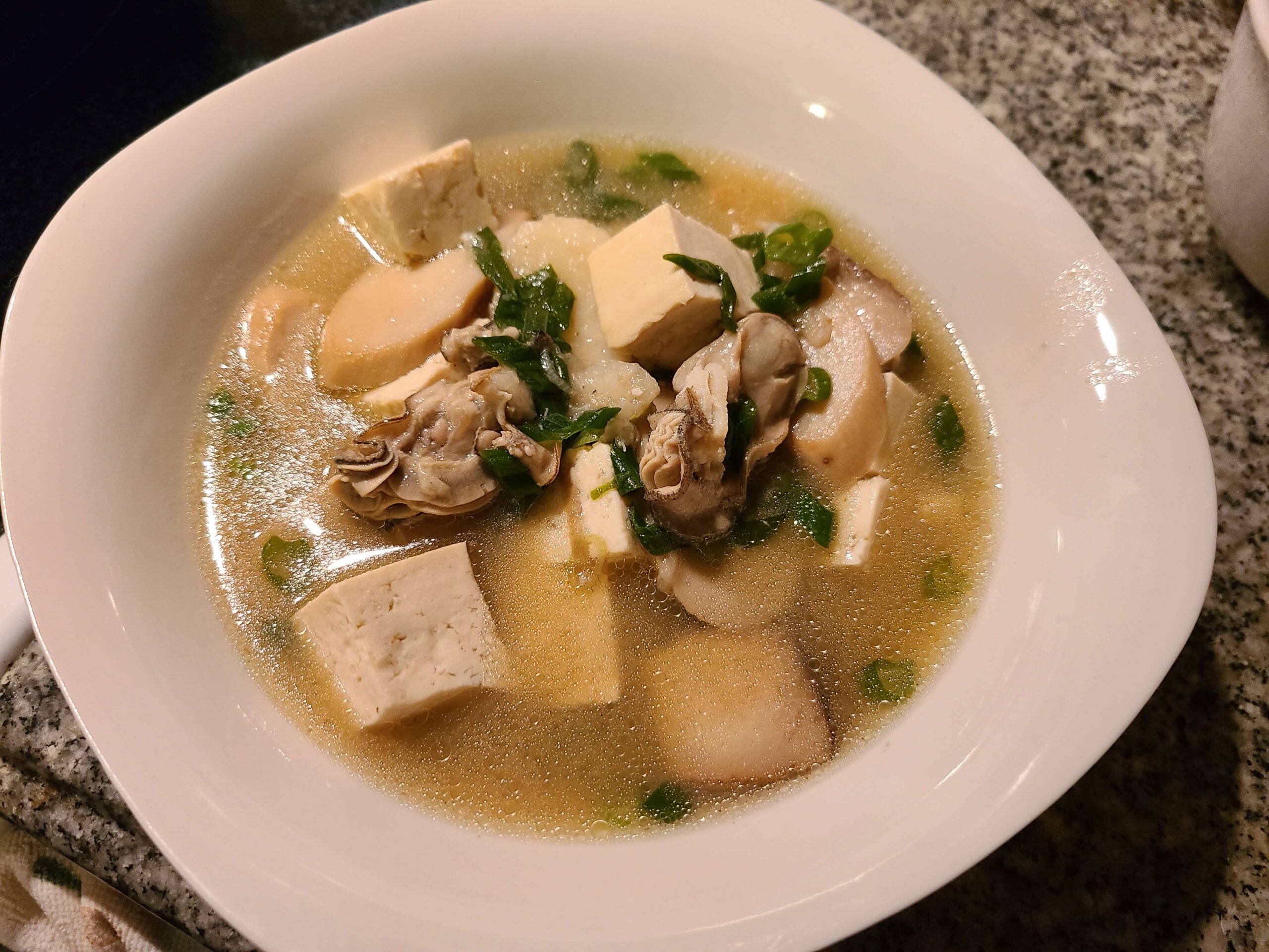 Tofu, oysters, and king oyster mushrooms