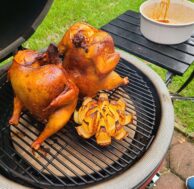 Beer can chicken with an onion