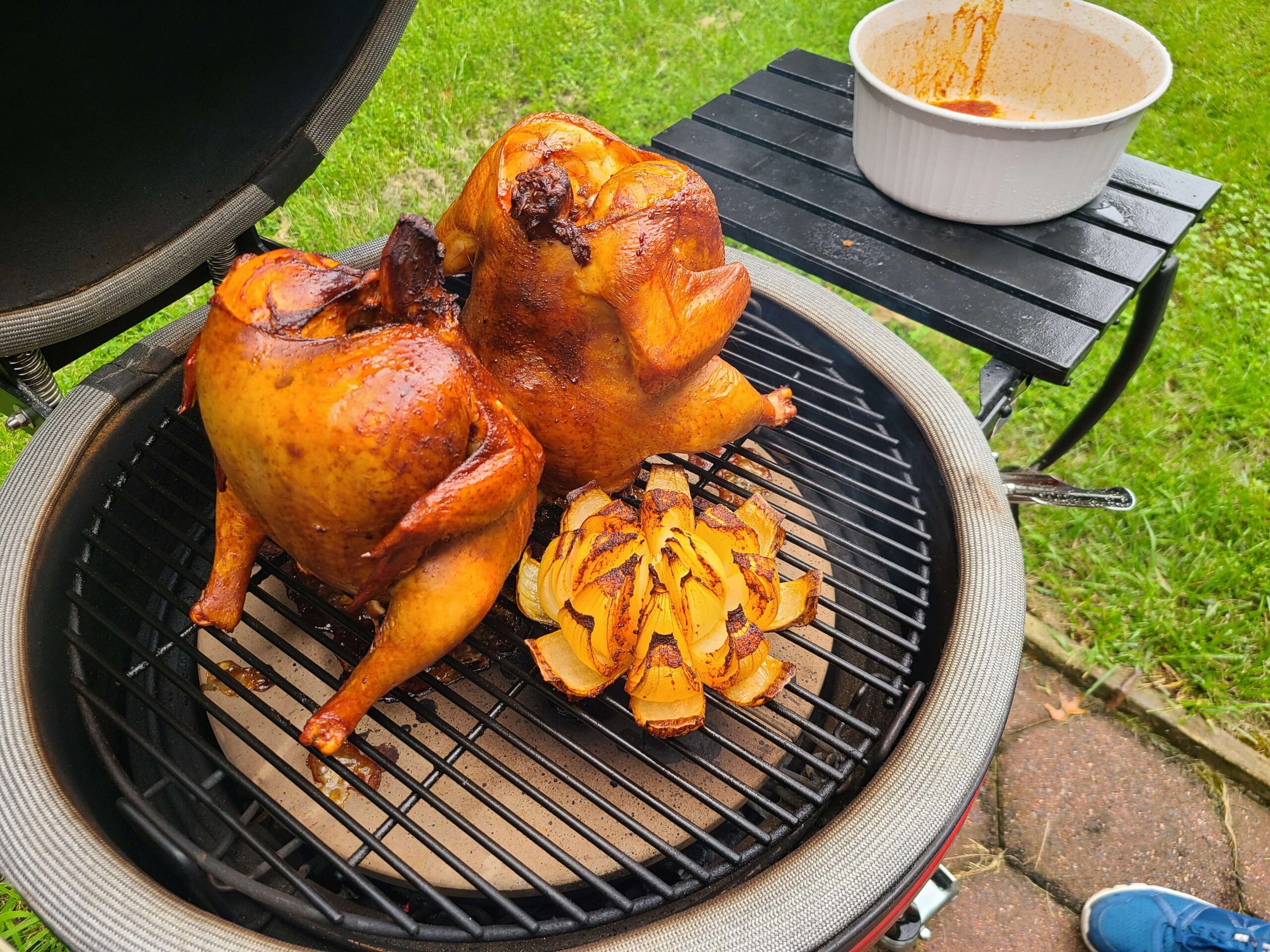 Beer can chicken with an onion