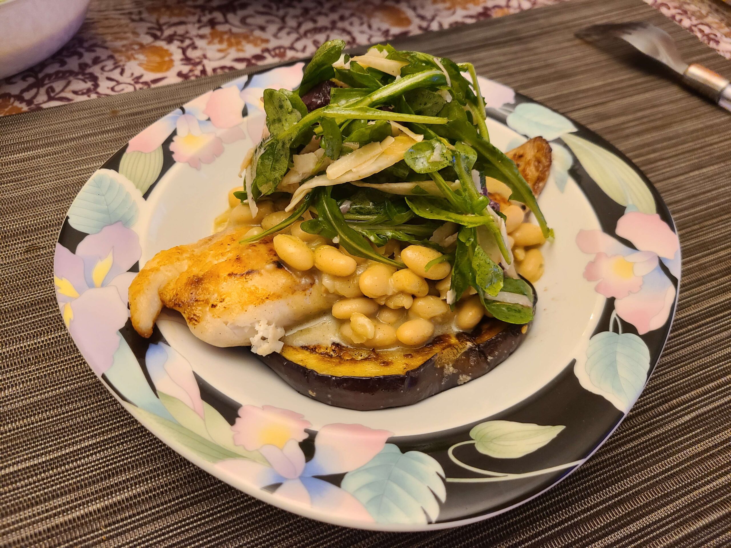 Fish, greens, beans, and eggplant