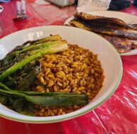 Kamut wheat pilaf with scallions and bronzino
