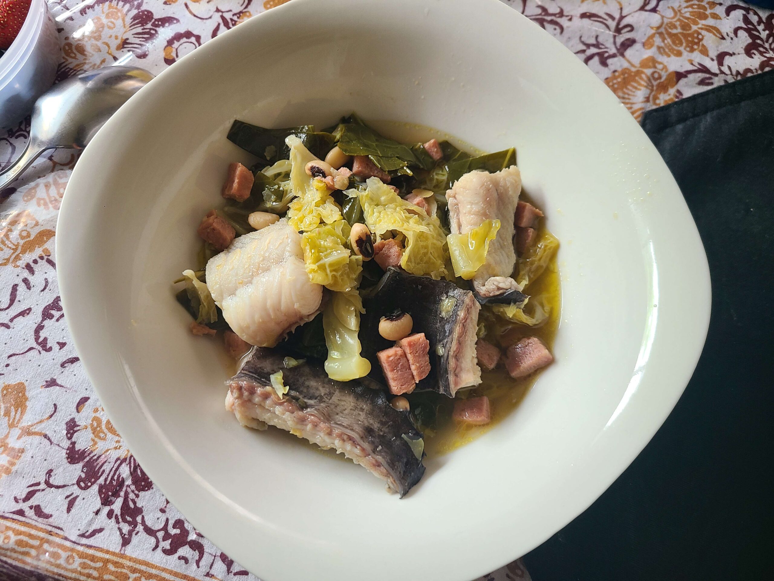 Monkfish in cabbage, kelp, and ham